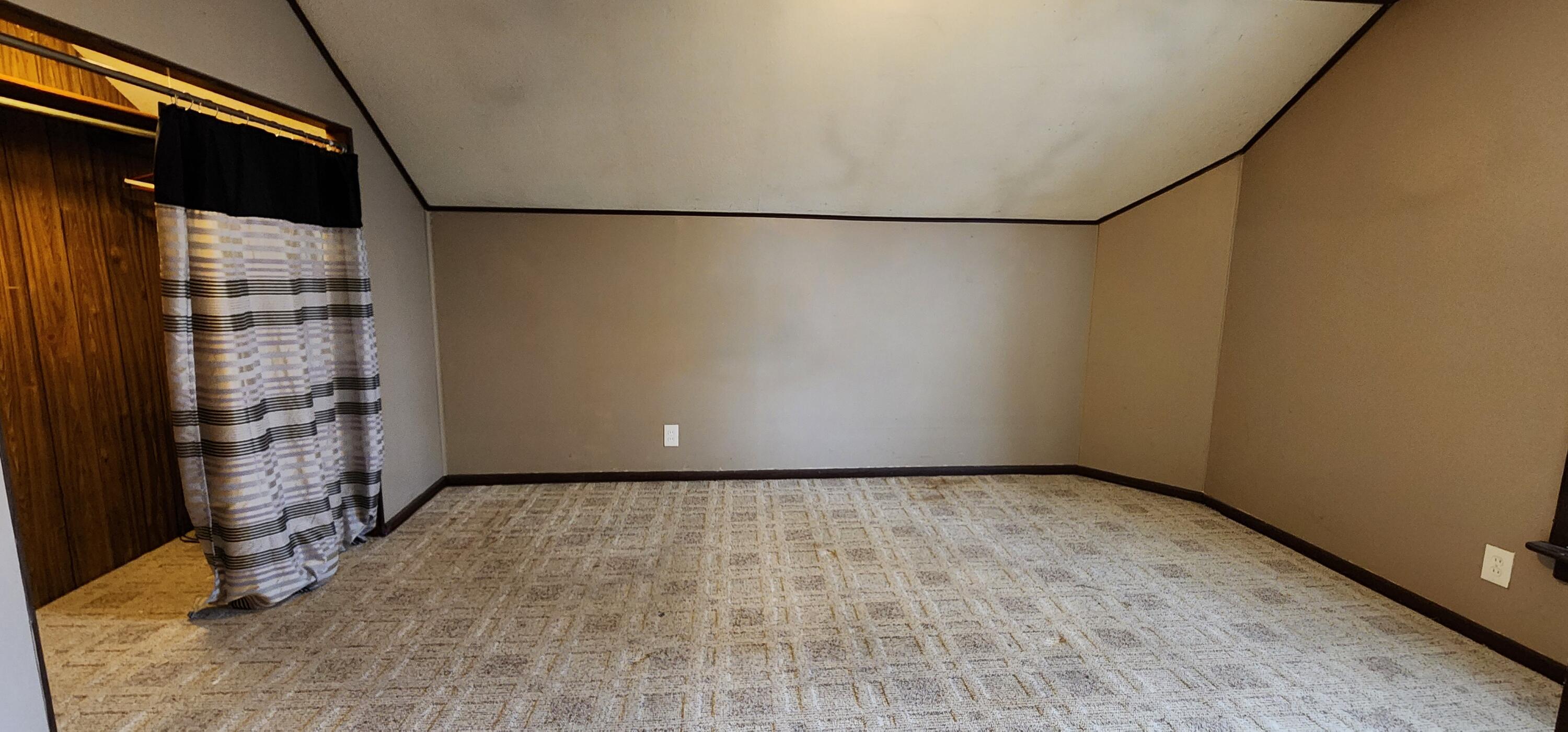 388 3rd Street, Unit 3 Manistee, MI 49660 - Photo 8 of 11 Bedroom (2) 20240325_113514