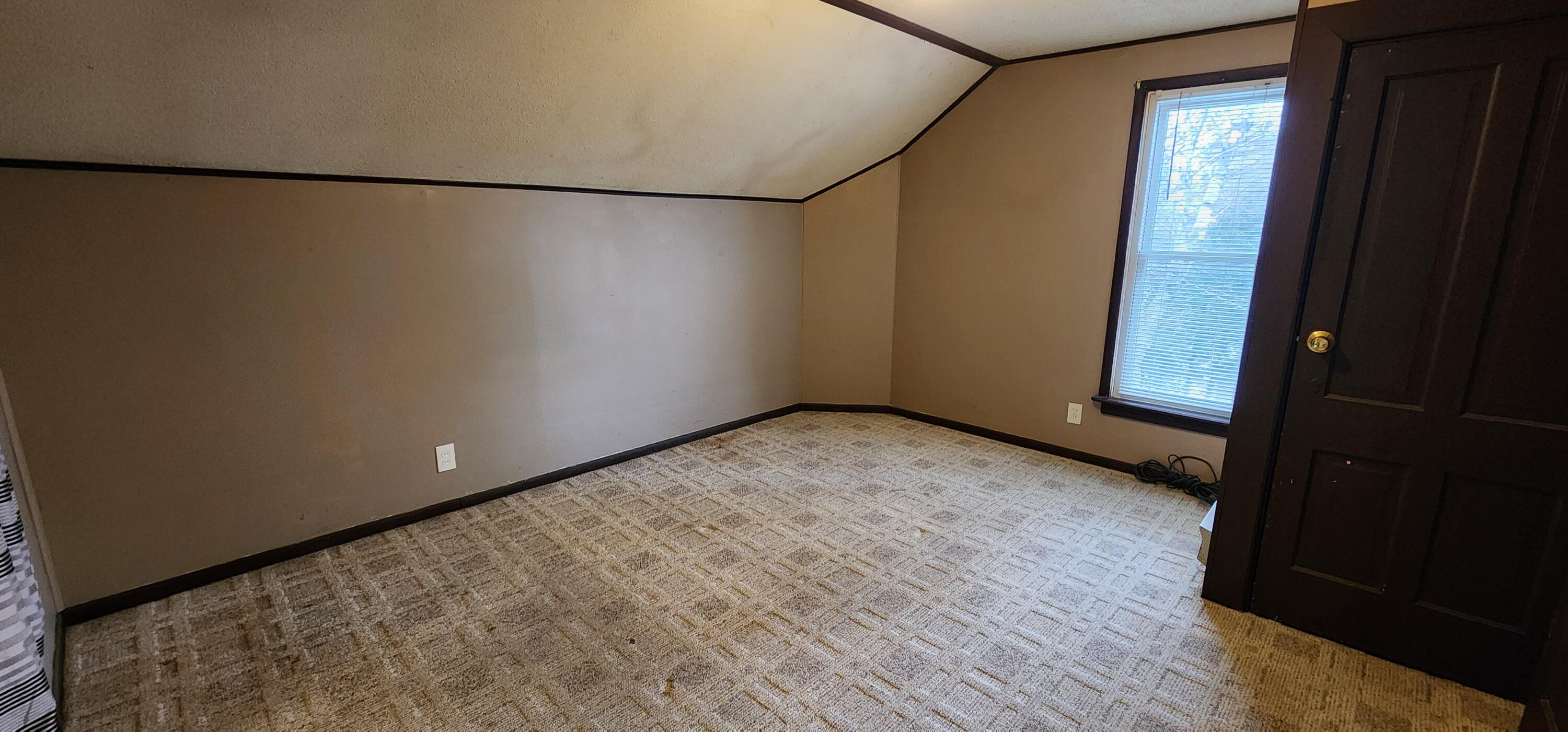 388 3rd Street, Unit 3 Manistee, MI 49660 - Photo 9 of 11 Bedroom (1) 20240325_113428