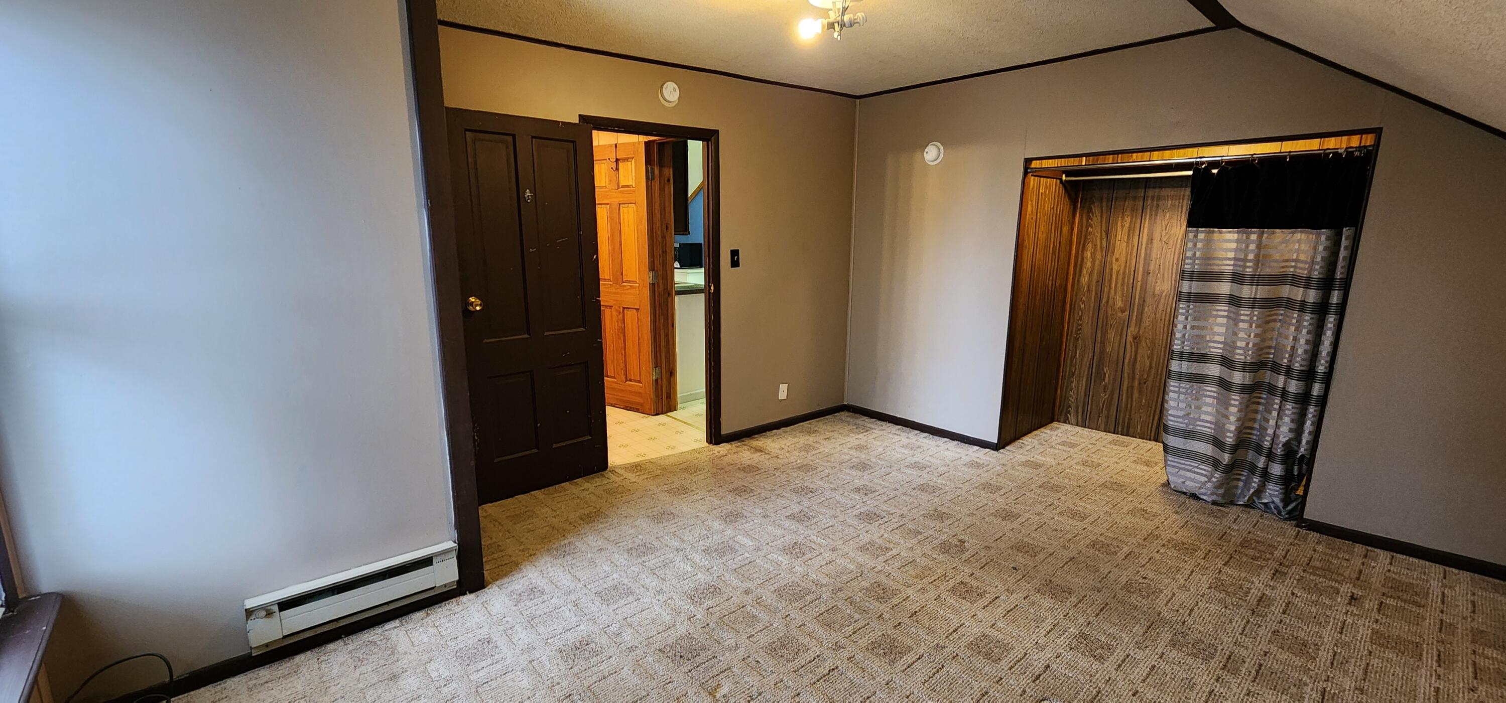 388 3rd Street, Unit 3 Manistee, MI 49660 - Photo 10 of 11 Bedroom (3) 20240325_113442