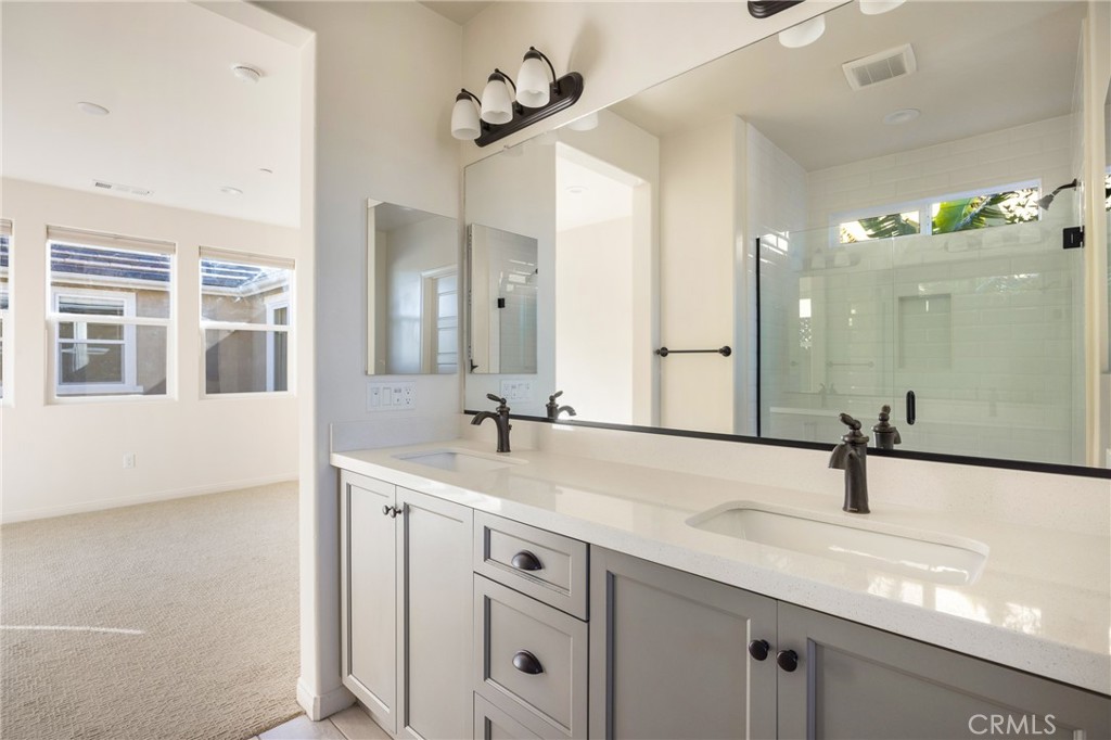 3940 Righetti Ranch Road San Luis Obispo, CA 93401 - Photo 11 of 18 a bathroom with a sink and a mirror