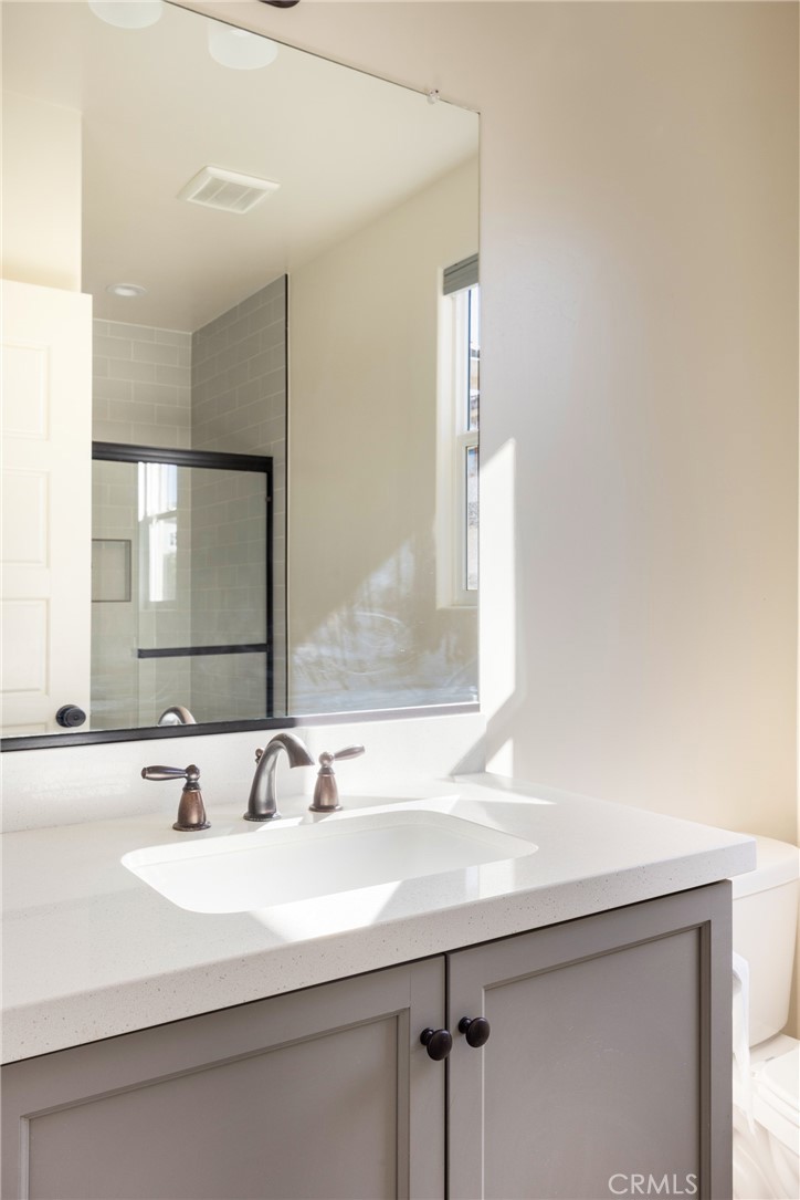 3940 Righetti Ranch Road San Luis Obispo, CA 93401 - Photo 13 of 18 a bathroom with a sink and a mirror