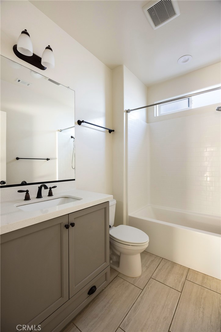 3940 Righetti Ranch Road San Luis Obispo, CA 93401 - Photo 16 of 18 a bathroom with a sink a toilet and a bathtub