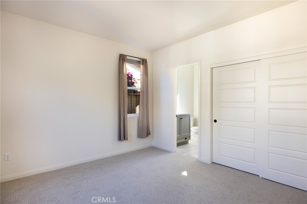 3940 Righetti Ranch Road San Luis Obispo, CA 93401 - Photo 9 of 18 an empty room with closet and mirror