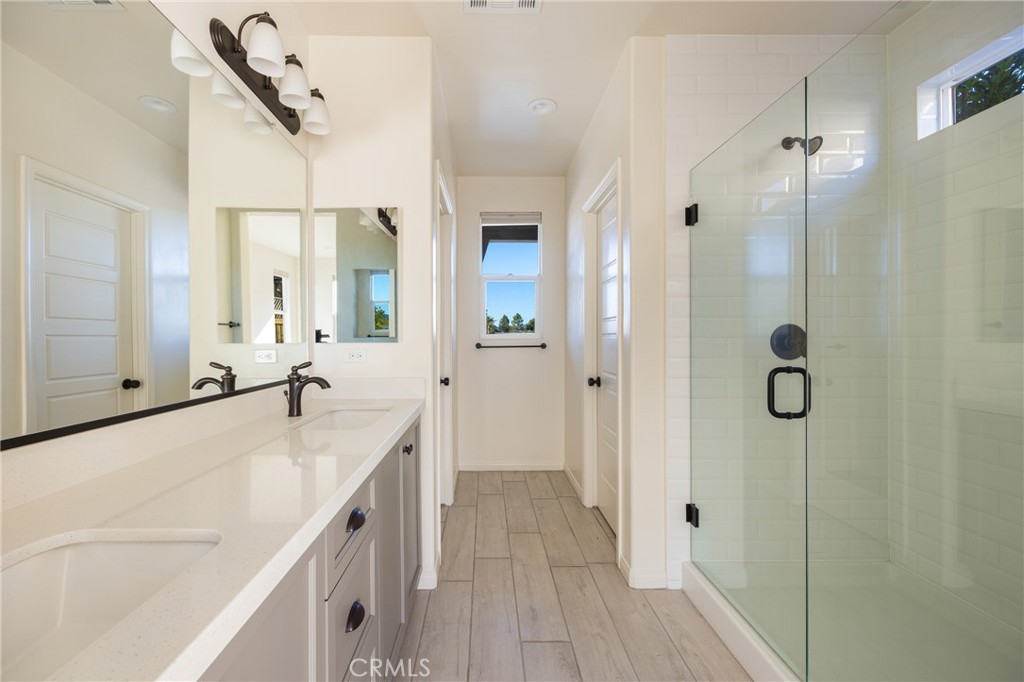 3940 Righetti Ranch Road San Luis Obispo, CA 93401 - Photo 10 of 18 a spacious bathroom with a tub sink and shower