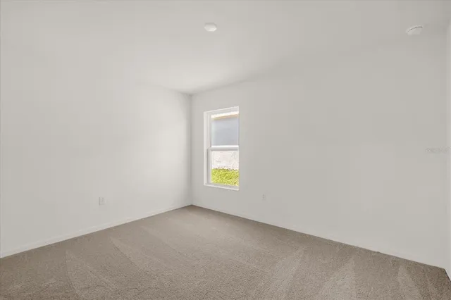a view of an empty room with window