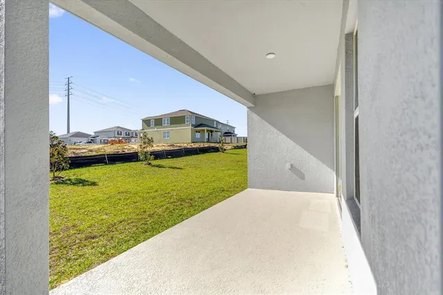 a view of a big room with a yard