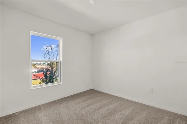 a view of an empty room with window