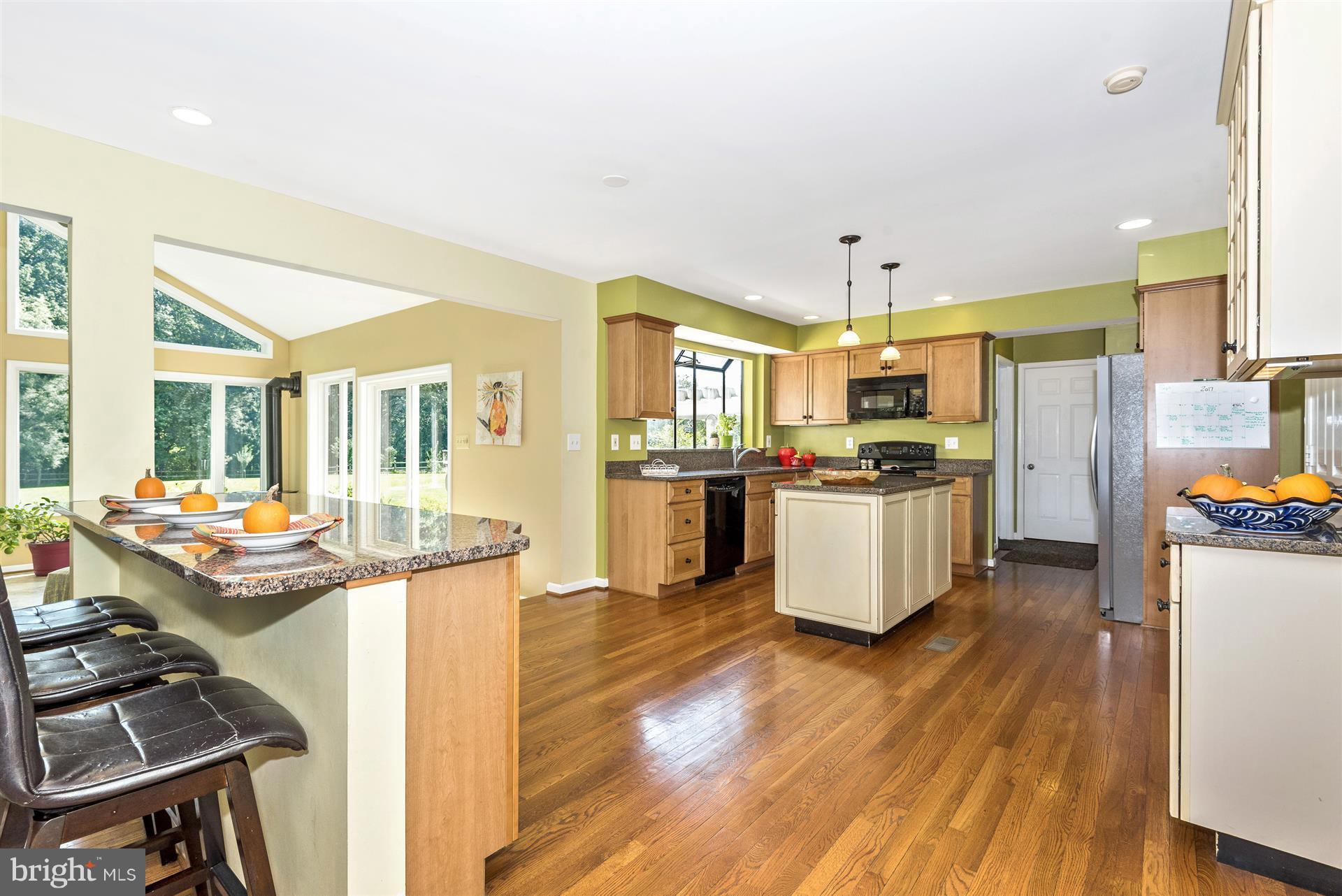 7017 Eden Mill Road Woodbine, MD 21797 - Photo 8 of 30 Breakfast Bar Overlooking Gourmet Kitchen