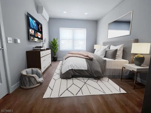 a bed room with a bed and a couch