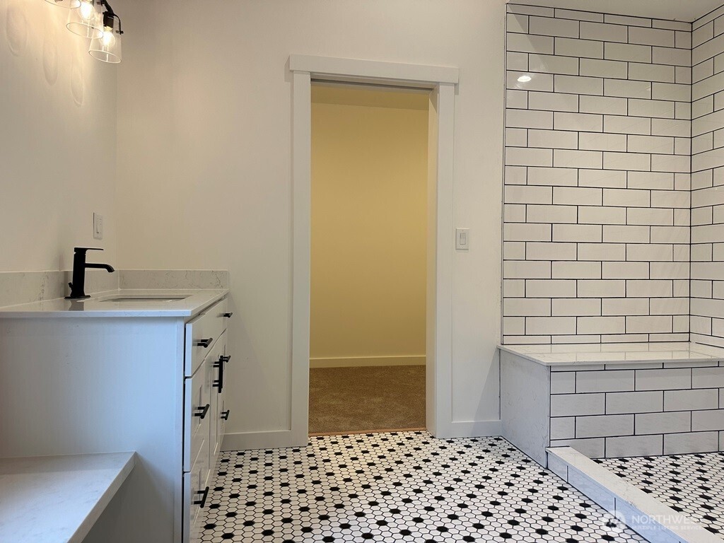 24345 Wax Orchard Road Southwest Vashon, WA 98070 - Photo 14 of 17 a bathroom with a sink a toilet and shower