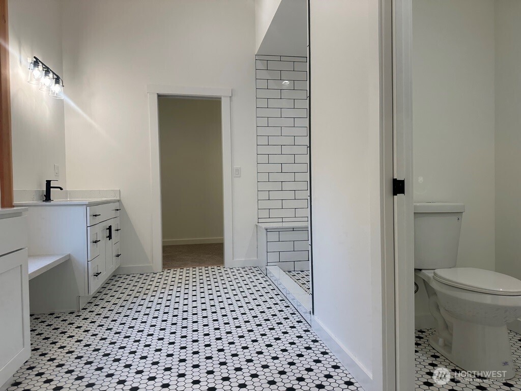 24345 Wax Orchard Road Southwest Vashon, WA 98070 - Photo 6 of 17 a bathroom with a sink and a toilet