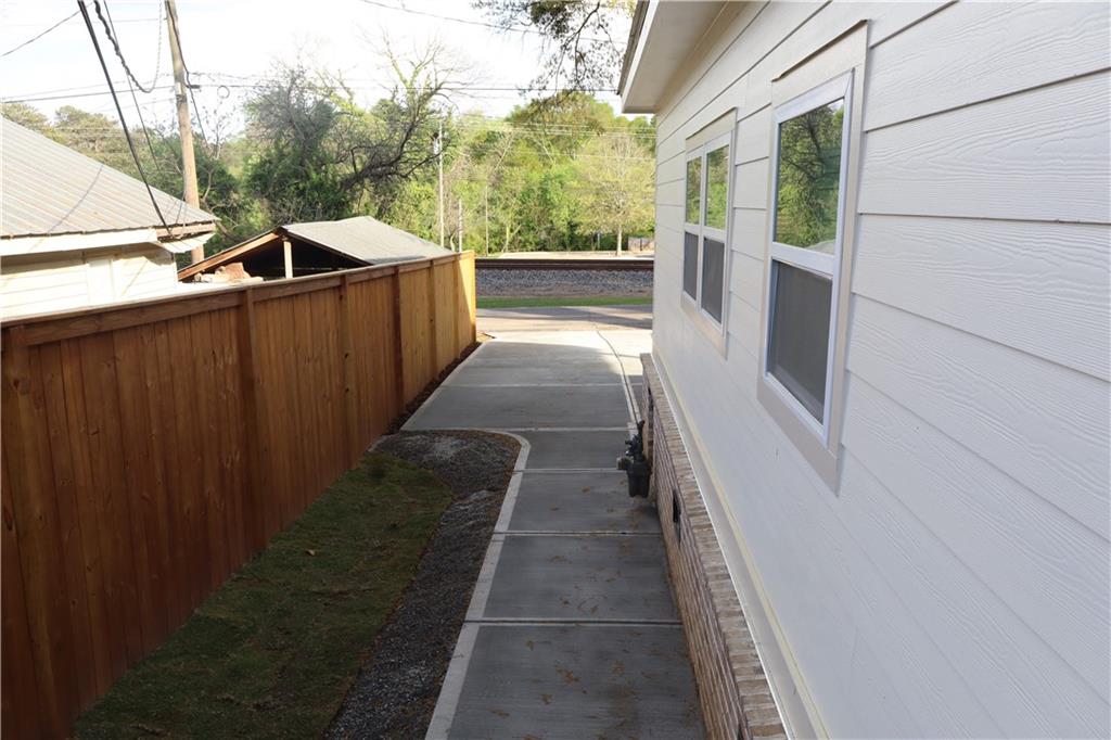 5120 Railroad Avenue Flowery Branch, GA 30542 - Photo 21 of 34 a view of a pathway