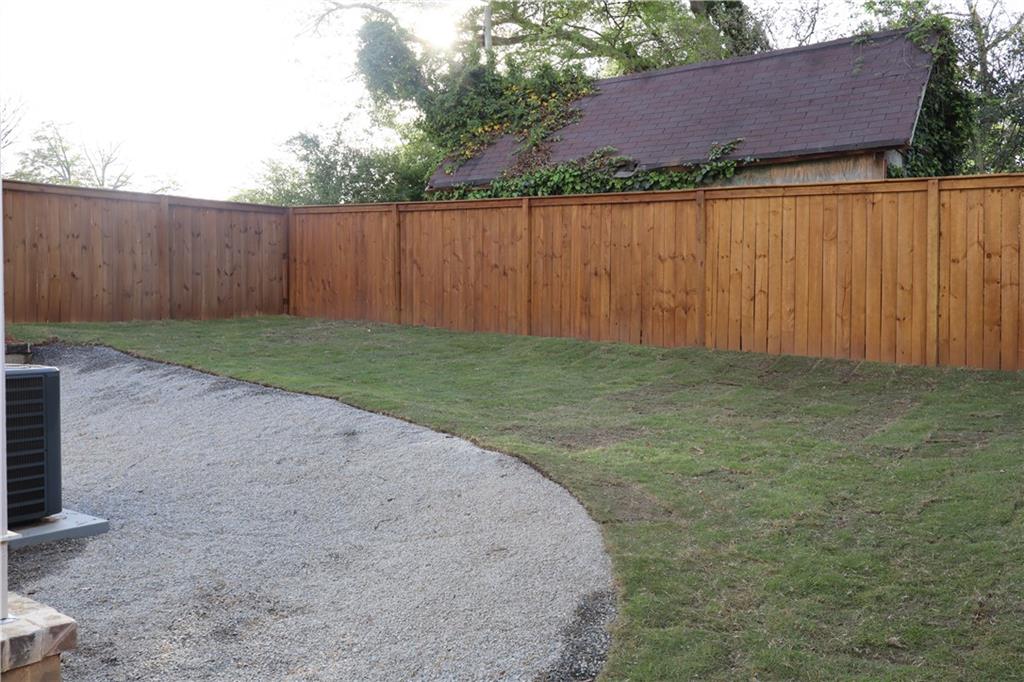5120 Railroad Avenue Flowery Branch, GA 30542 - Photo 23 of 34 a backyard of a house