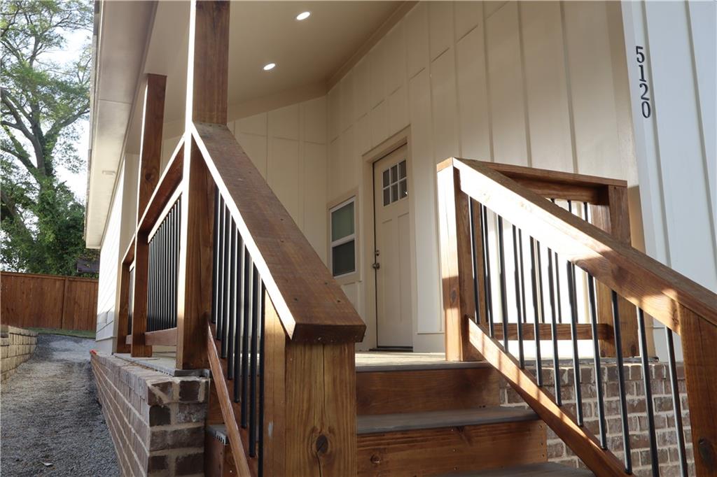 5120 Railroad Avenue Flowery Branch, GA 30542 - Photo 3 of 34 a view of staircase with railing and white walls