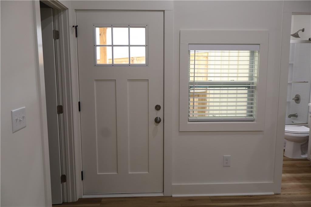 5120 Railroad Avenue Flowery Branch, GA 30542 - Photo 6 of 34 a bathroom with a window