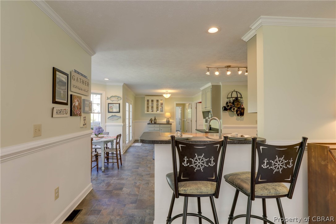 65 Thurston Road Mathews, VA 23109 - Photo 12 of 47 View from family room into eat in kitchen