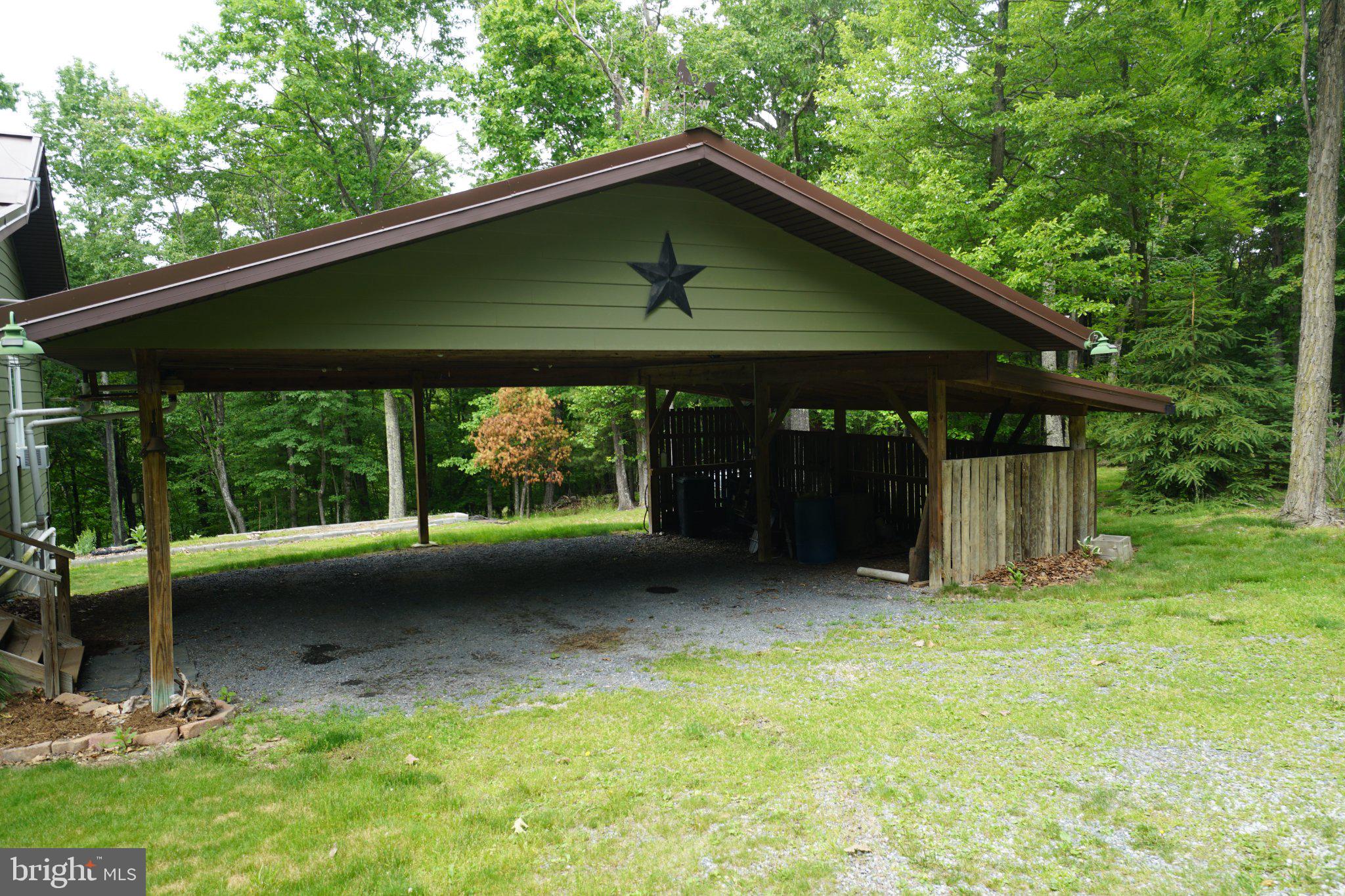 150 Sharp Ridge Lane Franklin, WV 26807 - Photo 3 of 69 Charming carport nestled in nature.