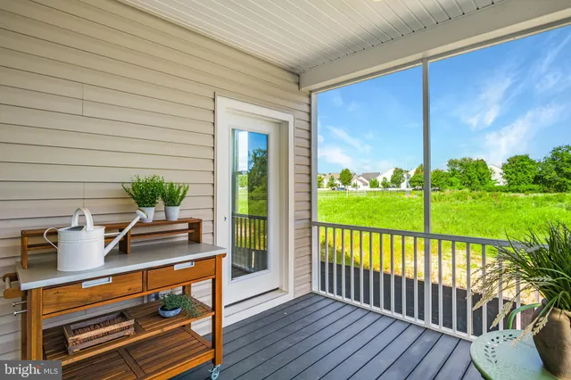 a view of a two chairs in the roof deck