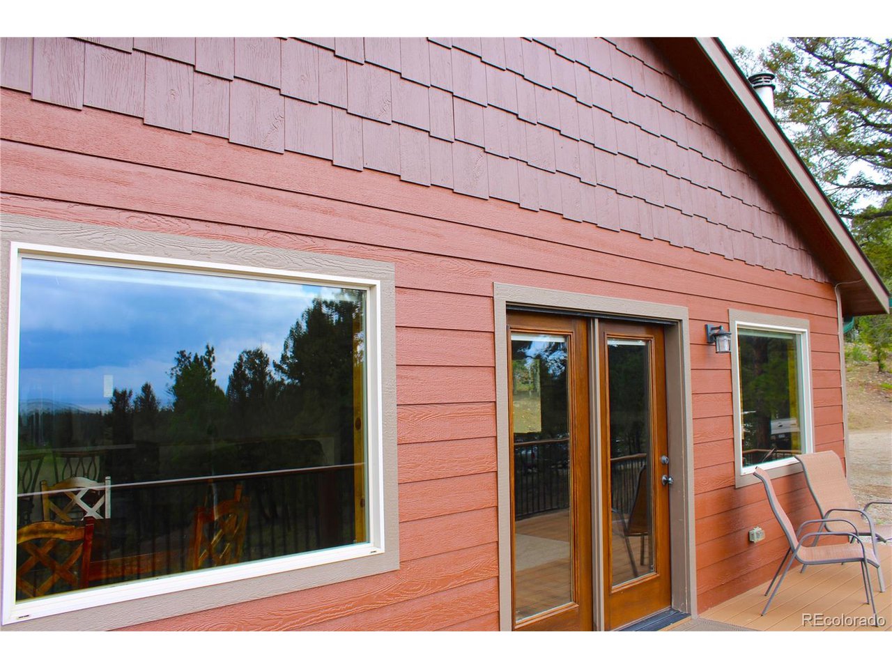 946 Singletree Road Hartsel, CO 80449 - Photo 9 of 50 Large Quality Windows and Patio Door Under Shake Shingle Siding!