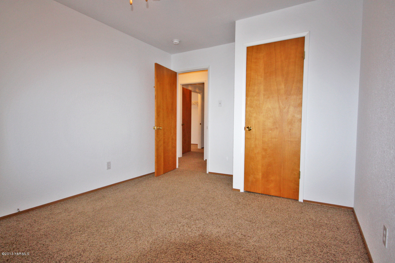 7303 Bittner Road Yakima, WA 98901 - Photo 29 of 38 a view of an empty room with a closet