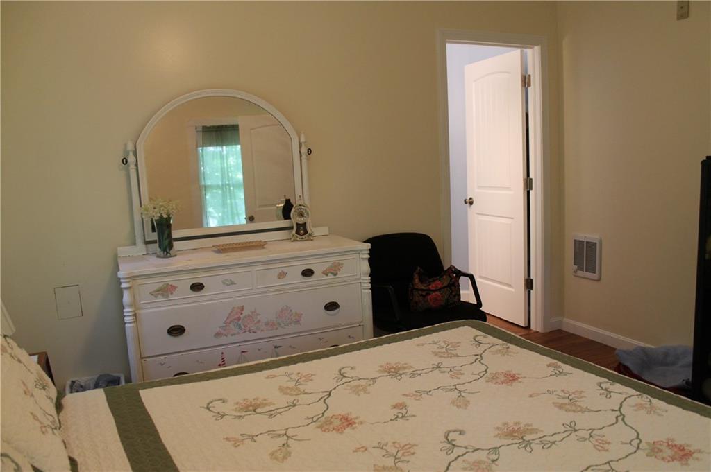 28 Knob Hill Road Naples, ME 04055 - Photo 10 of 23 Master bedroom with master bath