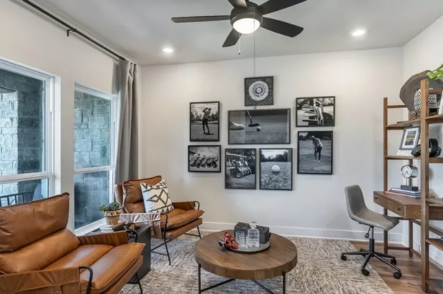 a bedroom with bed and a chandelier