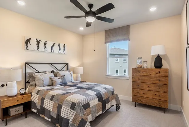 a view of a house with a large window and wooden floor