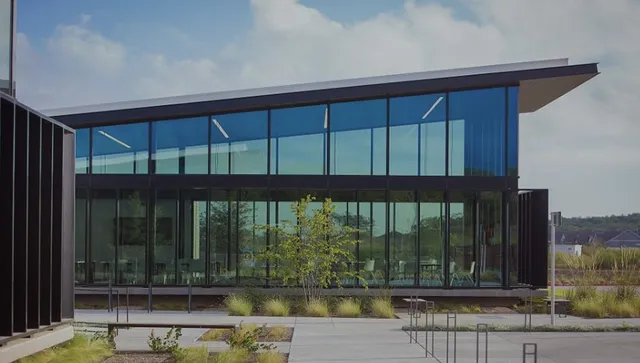 a view of swimming pool with outdoor seating and city view