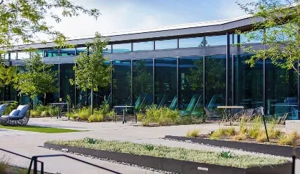 a view of a terrace with wooden floor and lake view