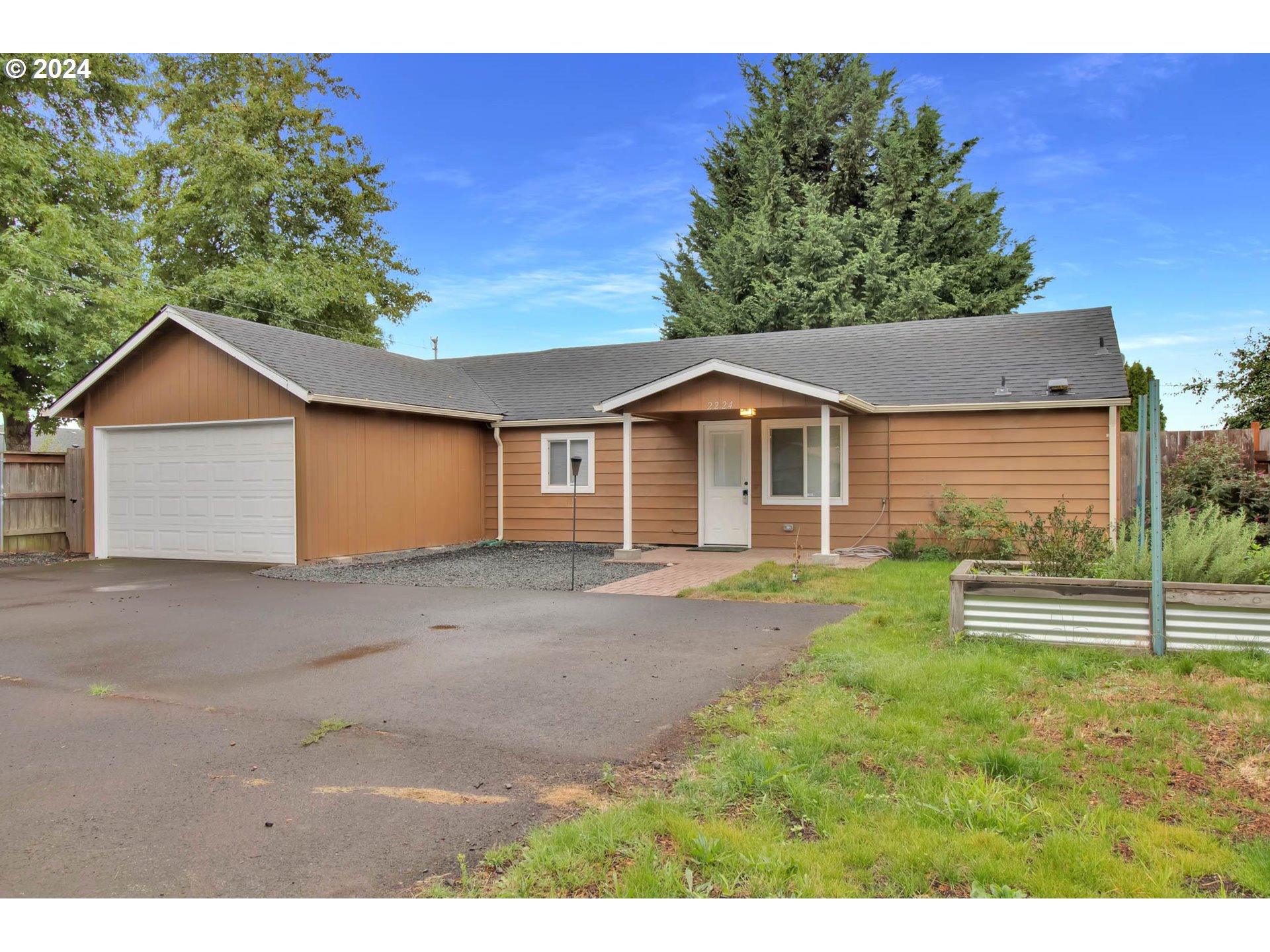 2224 Ohio Street Eugene, OR 97402 - Photo 2 of 31 a view of outdoor space yard and front view of a house