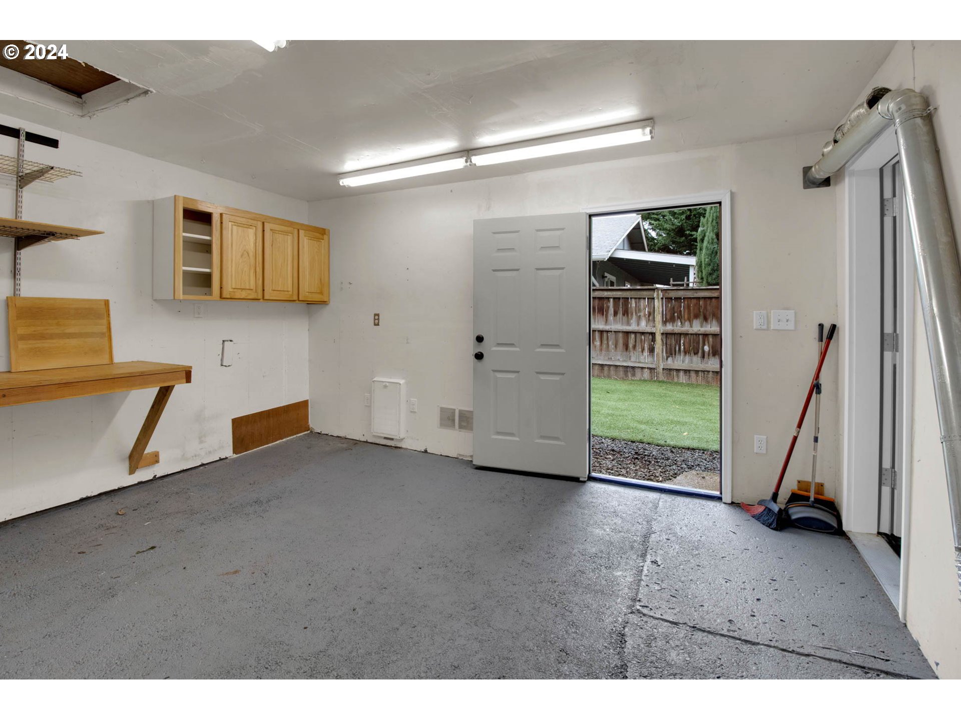 2224 Ohio Street Eugene, OR 97402 - Photo 24 of 31 a view of an empty room with a window