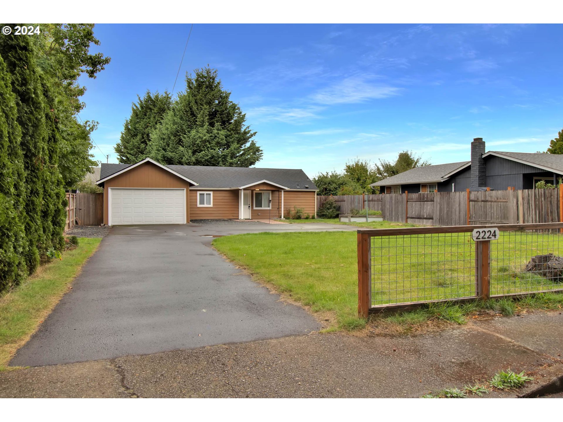 2224 Ohio Street Eugene, OR 97402 - Photo 4 of 31 a house view with a garden space