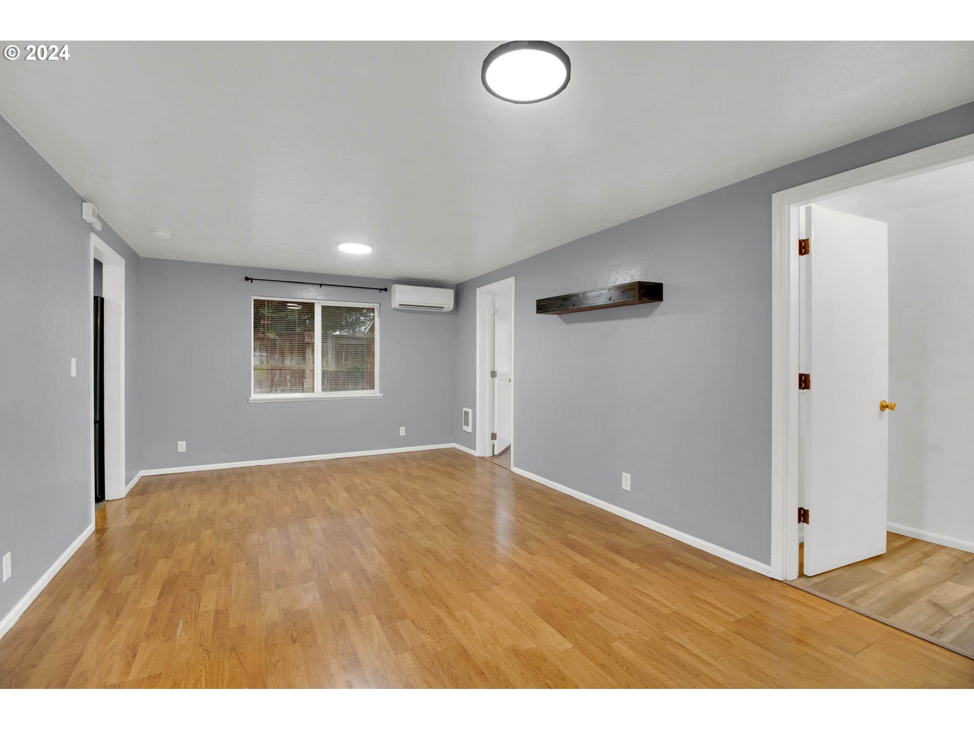 2224 Ohio Street Eugene, OR 97402 - Photo 5 of 31 a view of an empty room with a window