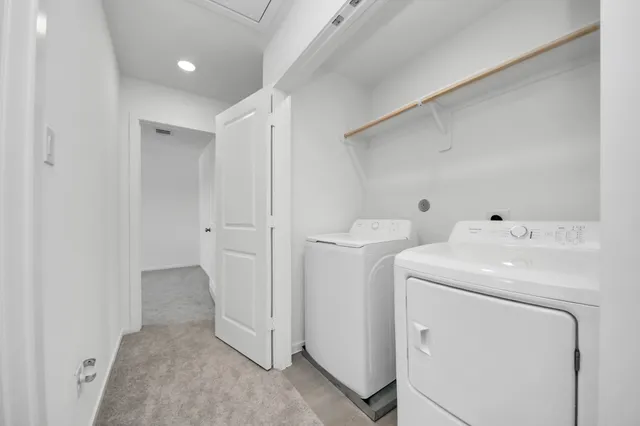 a view of yard with swimming pool and seating area