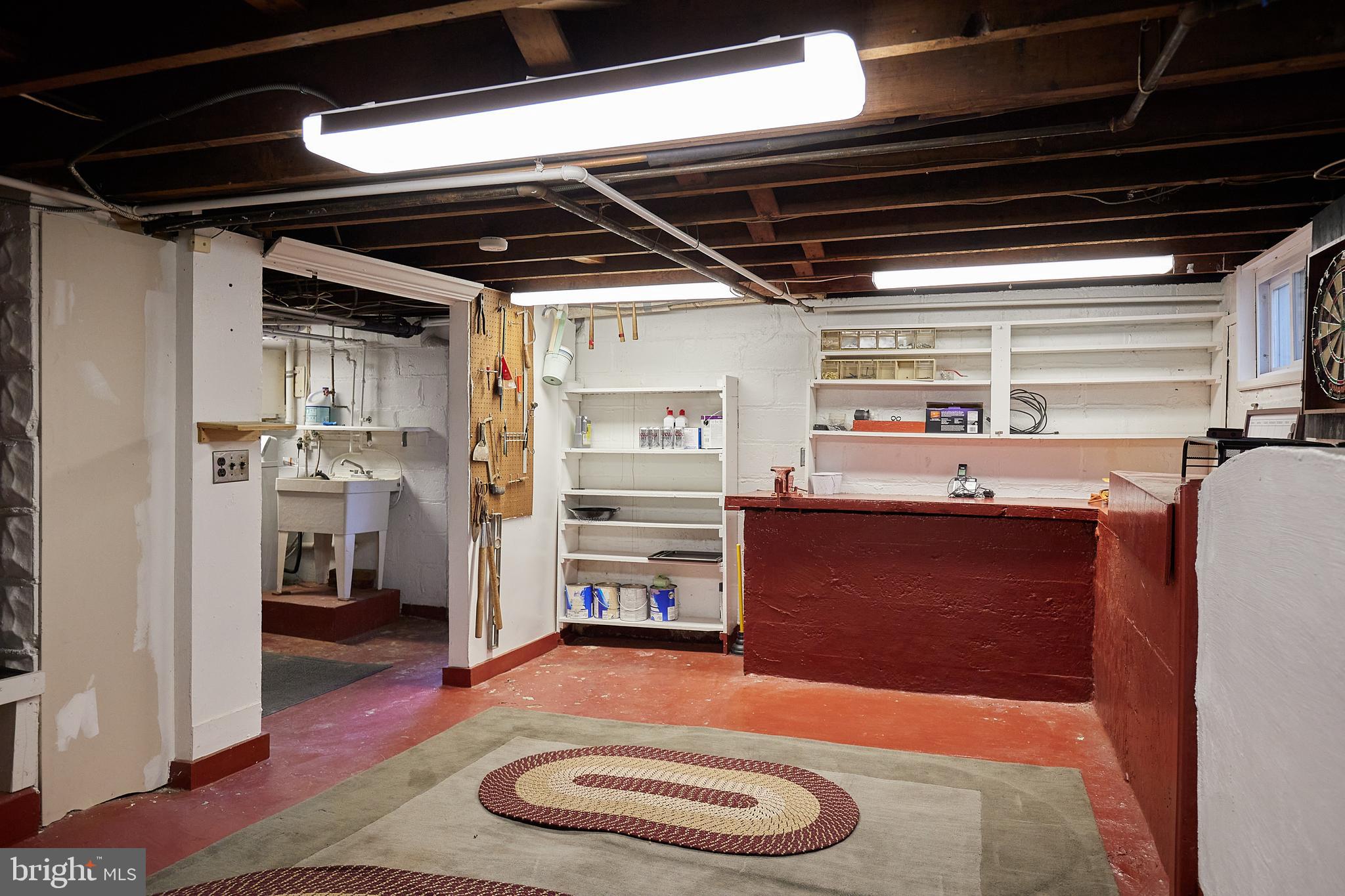 2913 24th Street North Arlington, VA 22207 - Photo 21 of 30 a kitchen with a refrigerator and a wooden floor