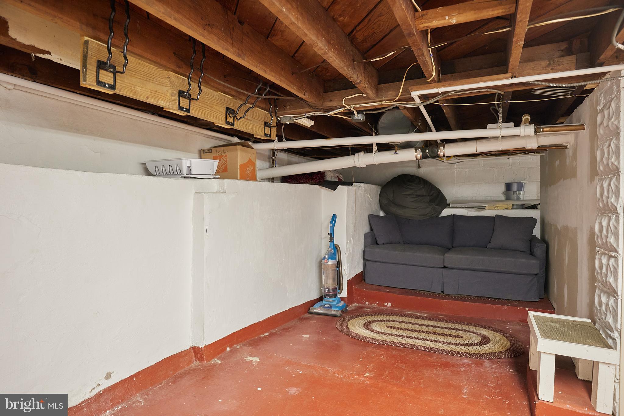 2913 24th Street North Arlington, VA 22207 - Photo 22 of 30 a view of storage and utility room with racks on the wall