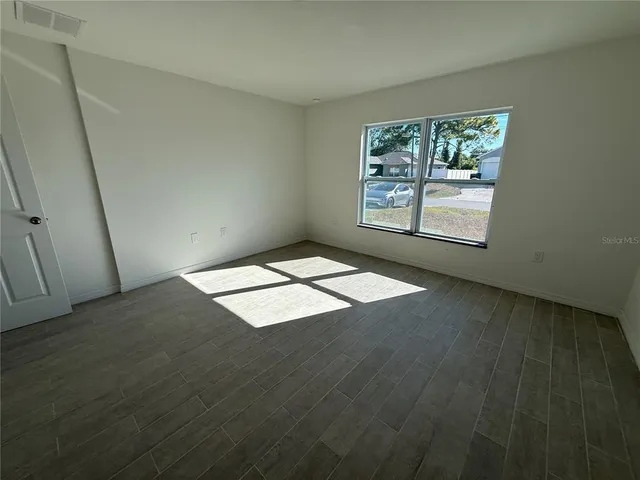 an empty room with windows