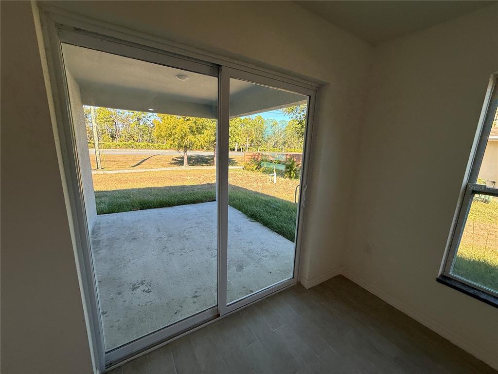 4971 Weatherton Street North Port, FL 34288 - Photo 27 of 30 a view of an empty room and a window