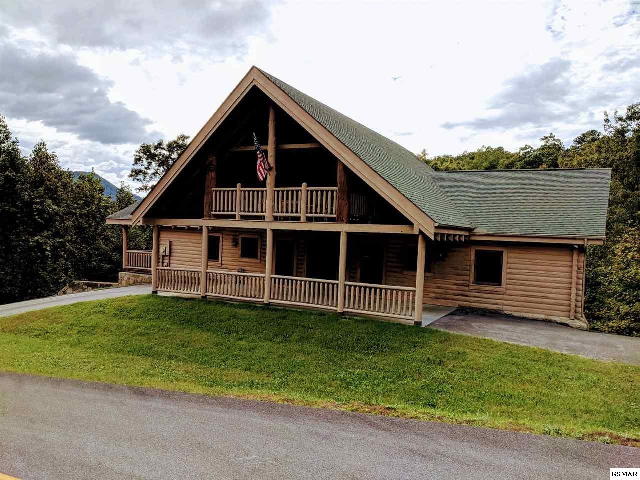 4409 Deerskin Road Sevierville, TN 37862 - Photo 8 of 31 a view of a house with a yard