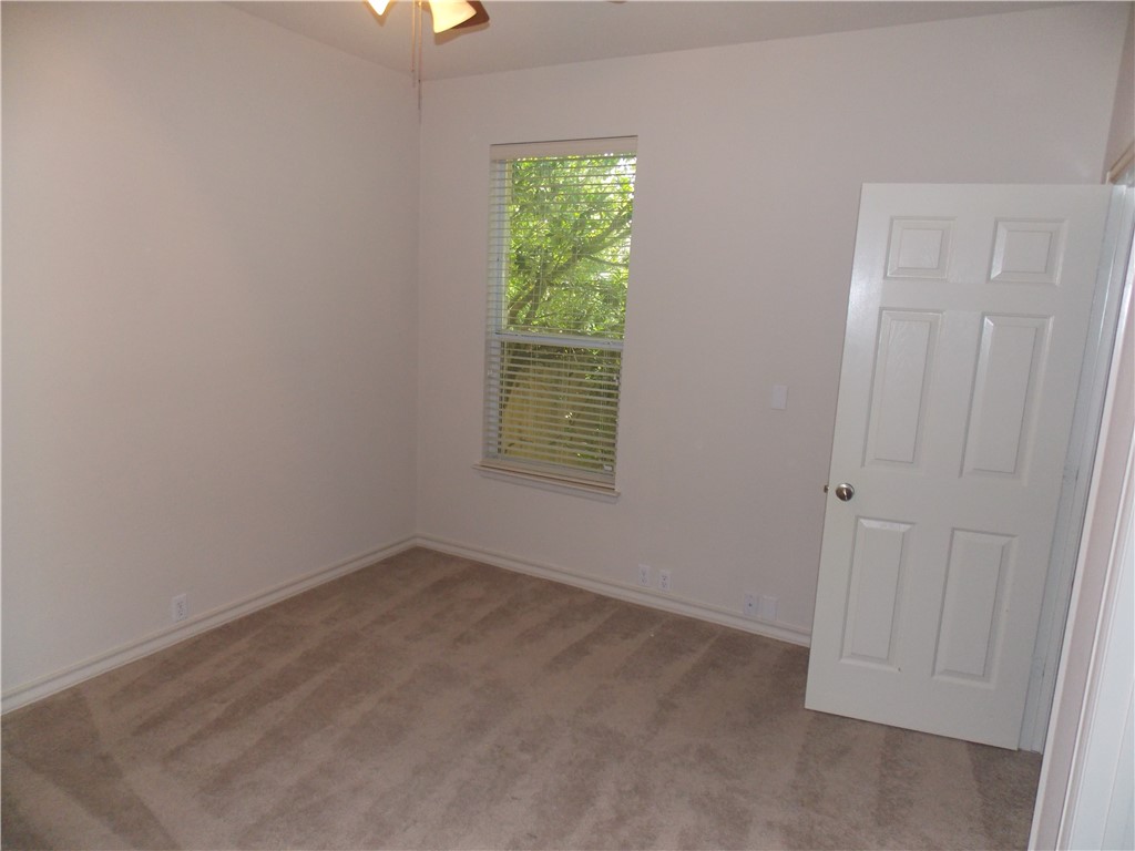 20961 Mandrake Drive Pflugerville, TX 78660 - Photo 12 of 34 an empty room with windows