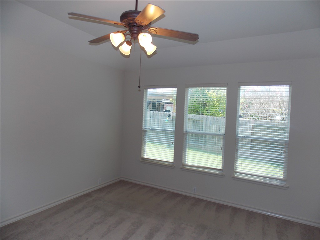 20961 Mandrake Drive Pflugerville, TX 78660 - Photo 20 of 34 a view of an empty room with a window