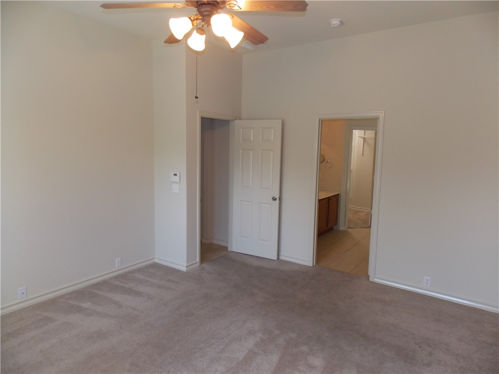 20961 Mandrake Drive Pflugerville, TX 78660 - Photo 21 of 34 wooden floor in an empty room
