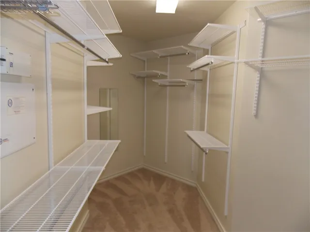 a bathroom with a shower and a tub