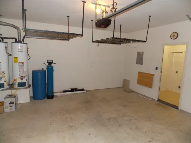 a bathroom with a glass shower door