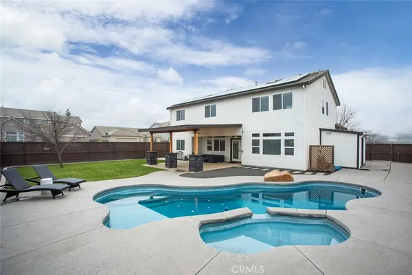 a view of pool with outdoor seating