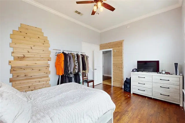 a bedroom with a bed and furniture