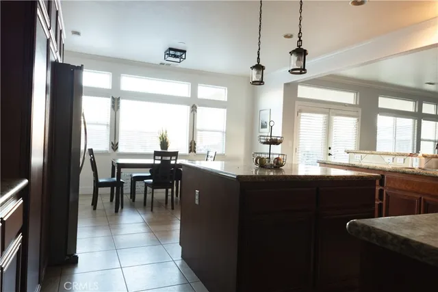 a kitchen with a large counter top space