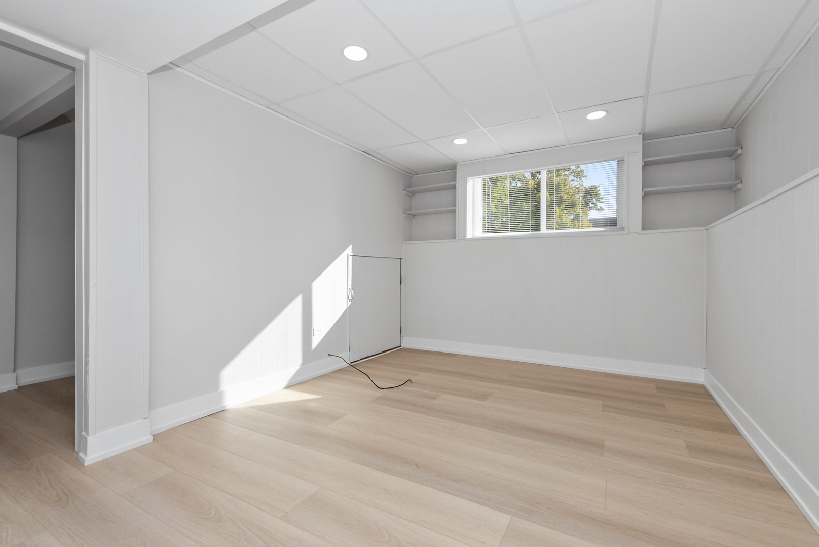 16822 91st Avenue Orland Hills, IL 60487 - Photo 11 of 21 an empty room with wooden floor and windows