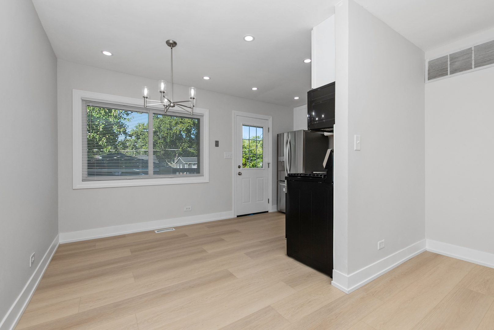 16822 91st Avenue Orland Hills, IL 60487 - Photo 6 of 21 an empty room with windows and closet