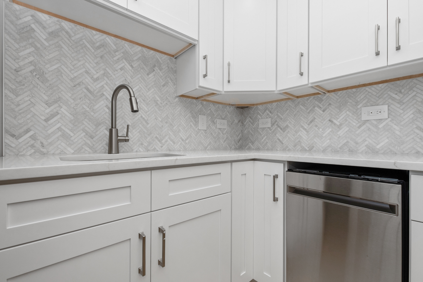 16822 91st Avenue Orland Hills, IL 60487 - Photo 7 of 21 a close view of a sink and cabinets in the kitchen
